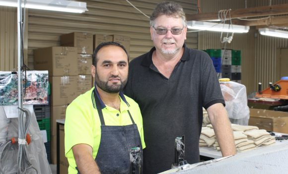 Corio job seeker Anas and EMU Australia factory manager Steve Maul.