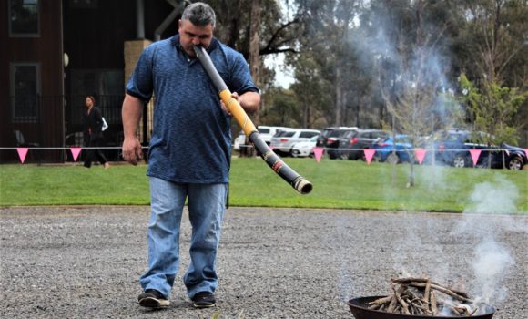 Man participating in indigenous smoking ceremony for Bendigo Deadly Yakka event